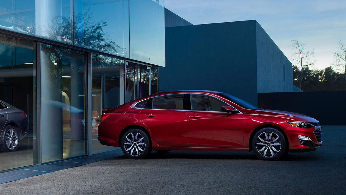 2020 Chevy Malibu parked outside Showroom