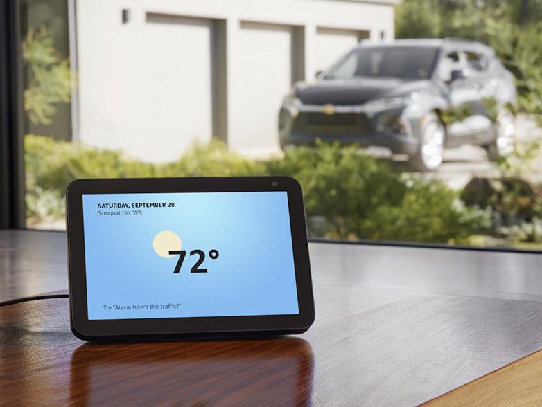 Tablet on table with chevy outside Tablet on table with chevy outside