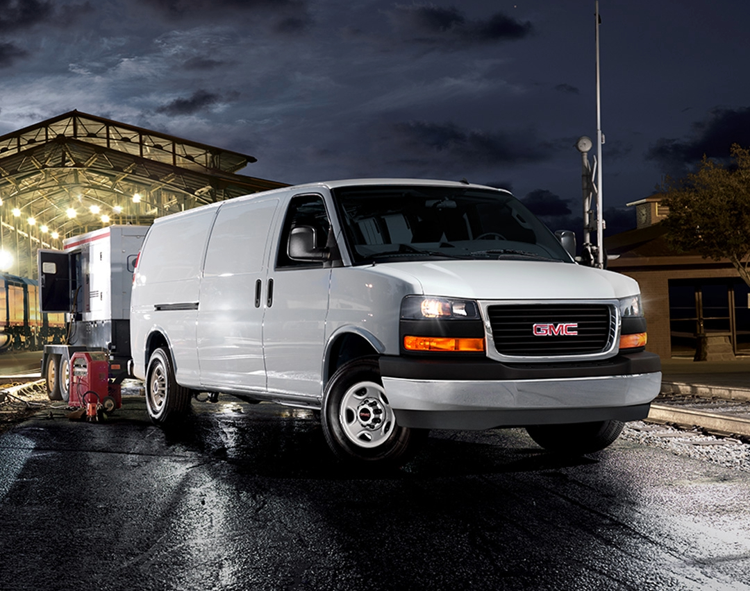 2024 GMC Savana Hauling a Generator on a Trailer