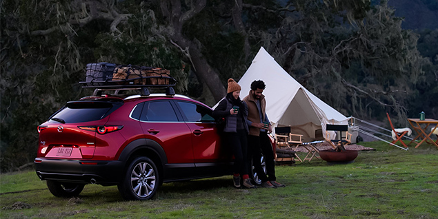 Mazda CX-30 parked in front of a scenic view