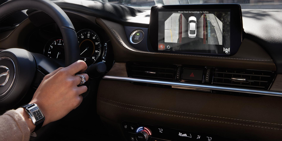A person sitting in a 2020 Mazda6