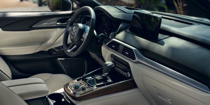 A person sitting in a 2020 Mazda6