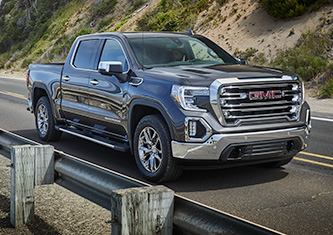 2019 GMC Sierra 1500 driving on road in the mountains