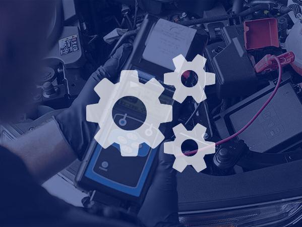 Service technician doing diagnosis on a vehicle. Service technician doing diagnosis on a vehicle.