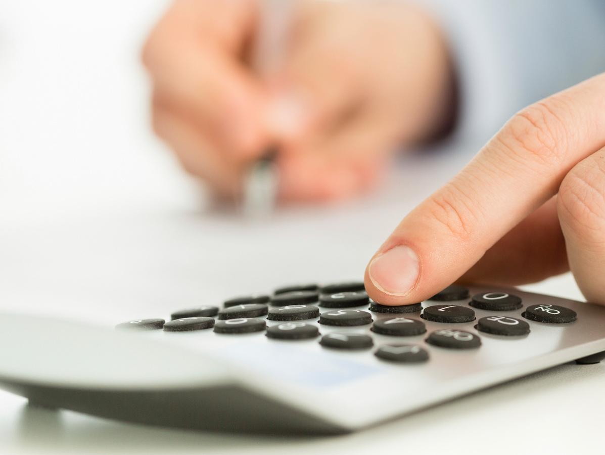 Hand with Calculator