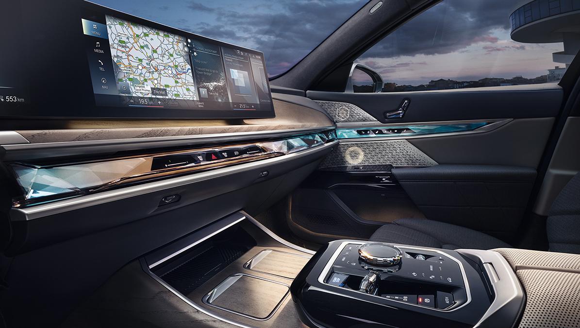 BMW Interaction Bar extending across the cockpit and integrating controls while providing illumination