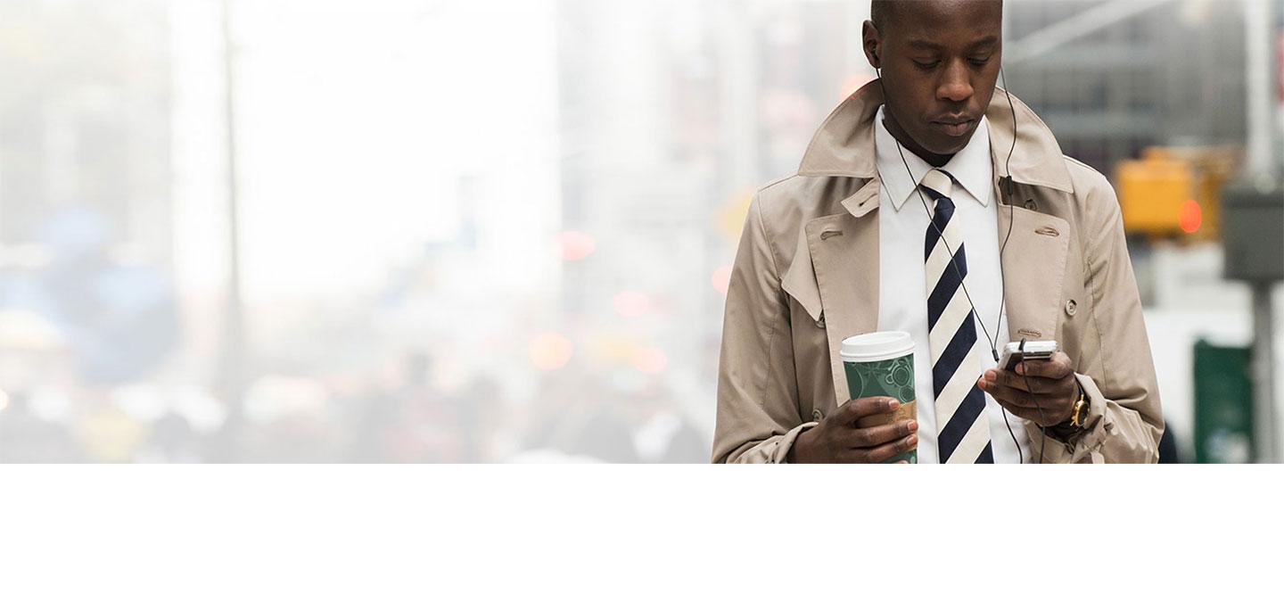 Ford customer holding cell phone