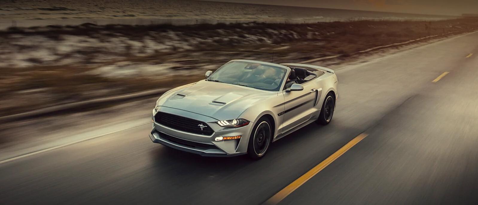 2021Ford Mustang cruising on the road. 2021Ford Mustang cruising on the road.
