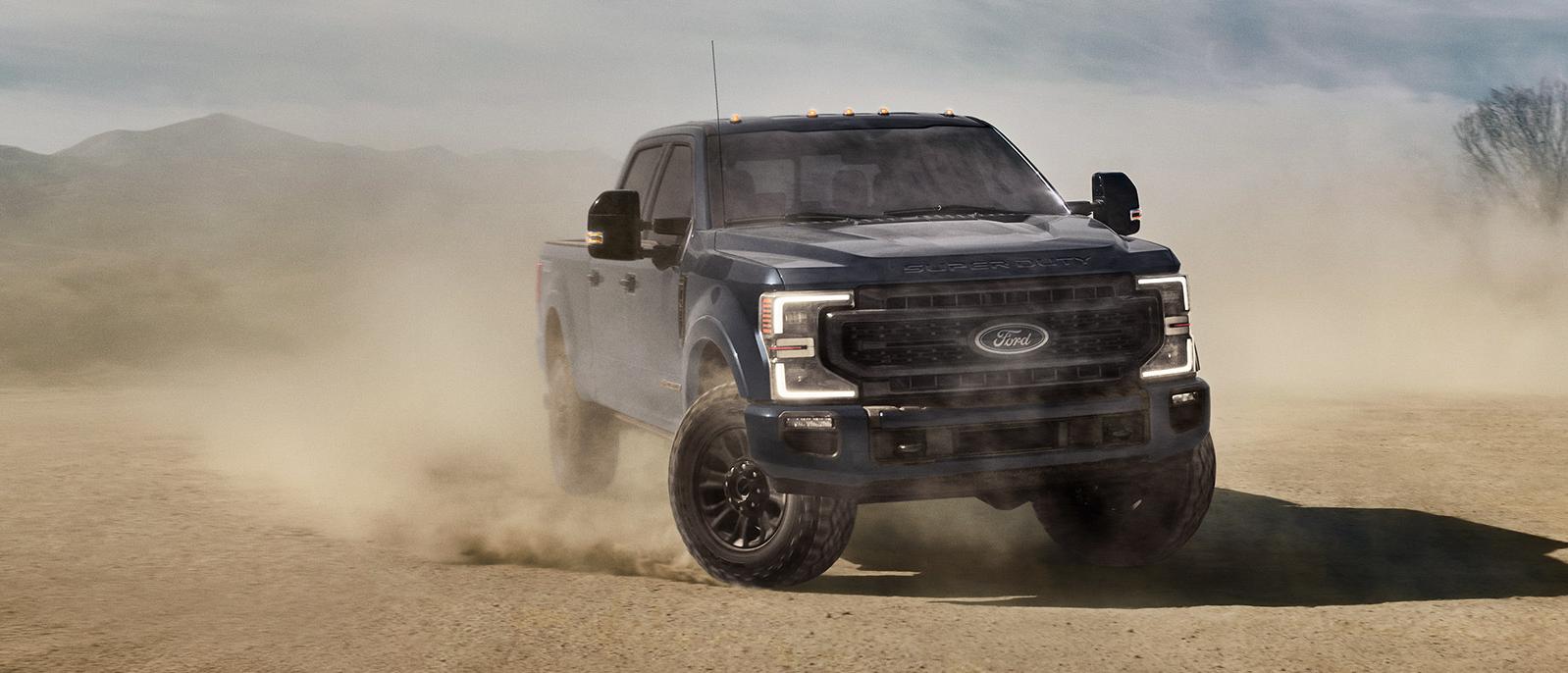 2022 dark blue Ford Super Duty in the desert. 2022 dark blue Ford Super Duty in the desert.