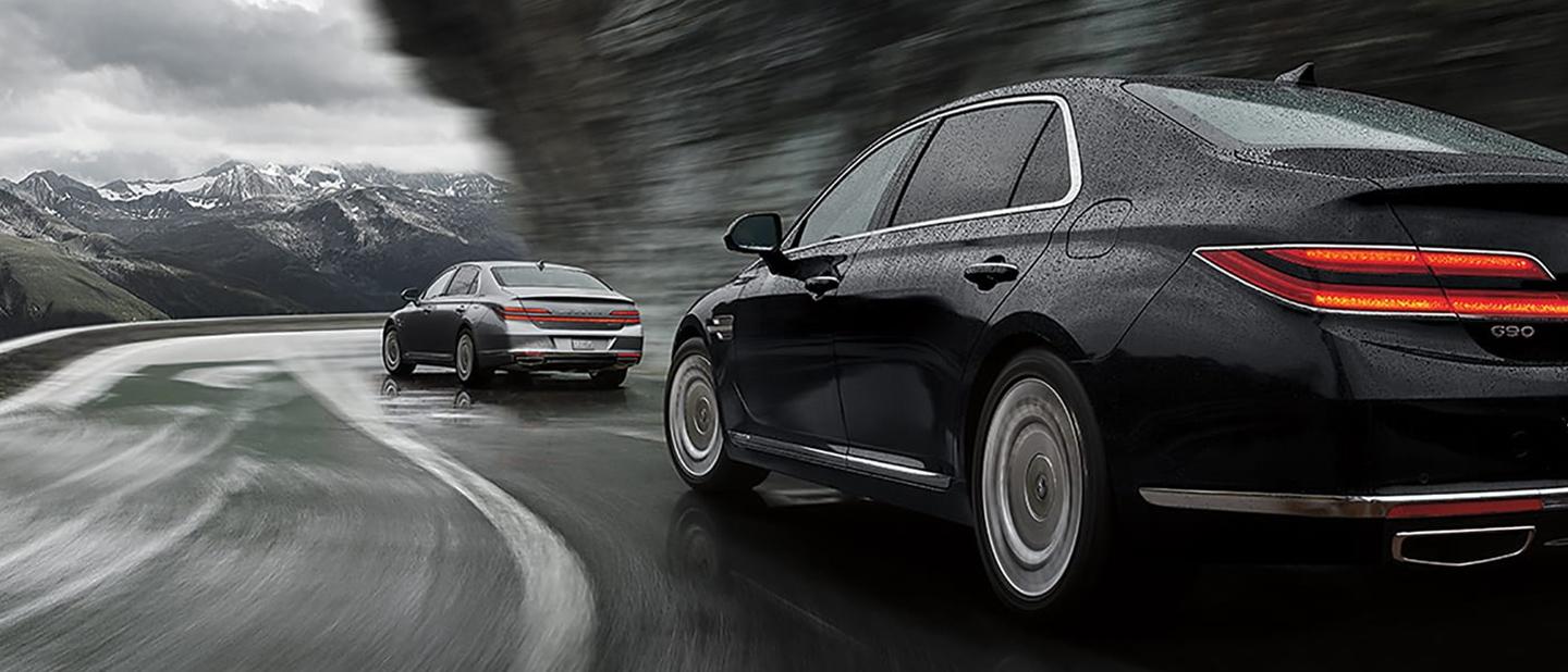 Genesis G90 driving on road