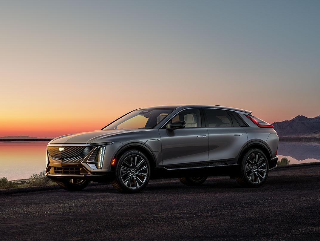 2023 Cadillac Lyriq parked on road, drivers side during sunset