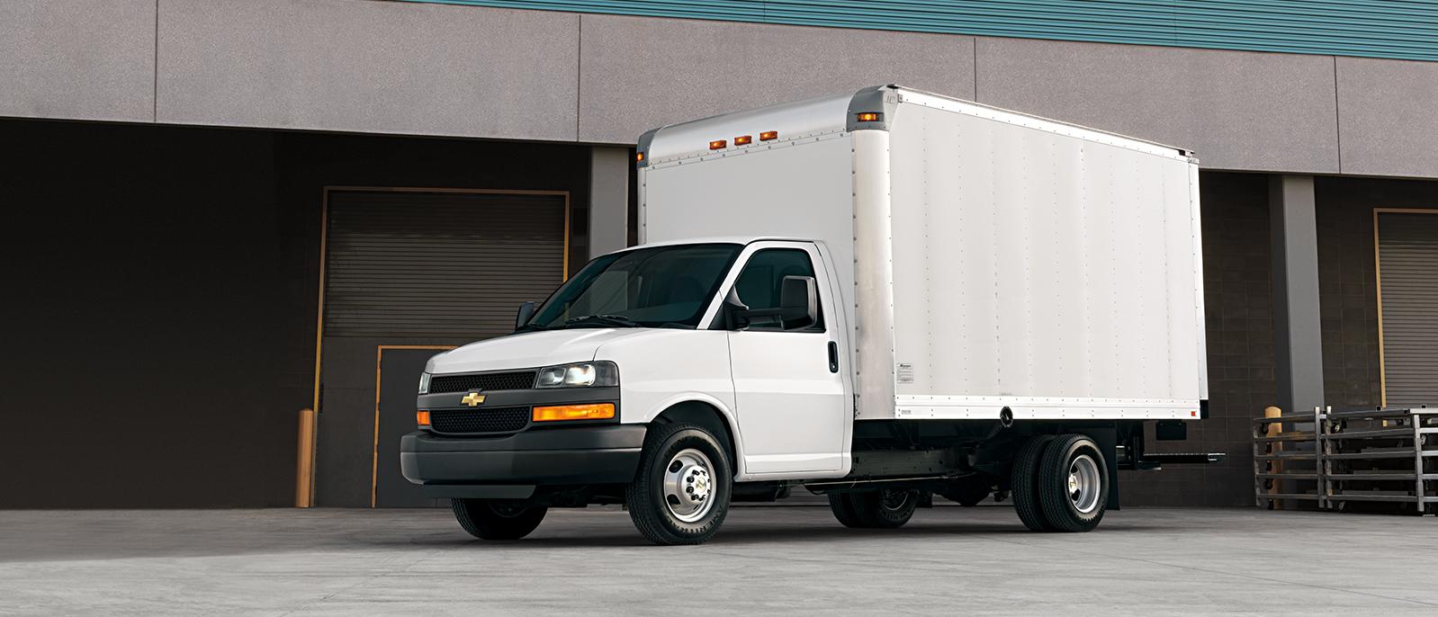 2021 Chevy Express Cutaway parked in front of a building. 2021 Chevy Express Cutaway parked in front of a building.