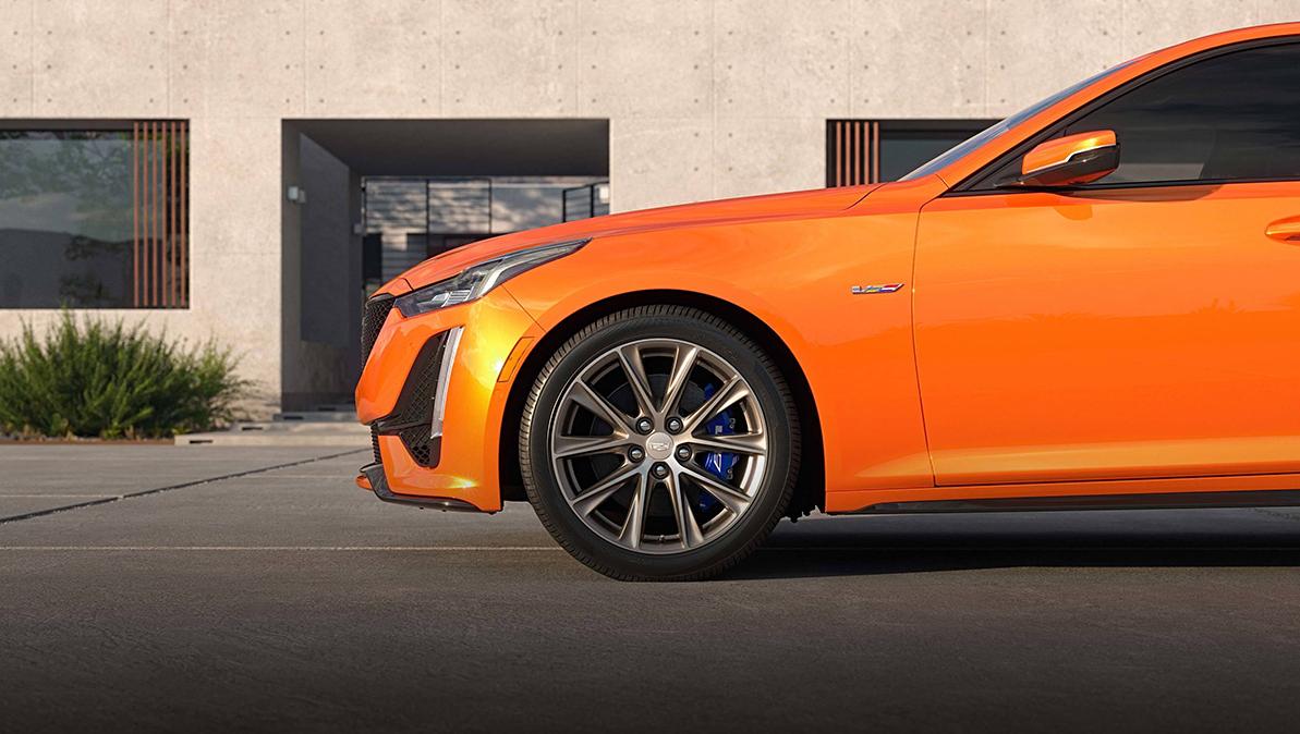 Side view of orange Cadillac CT5-V.