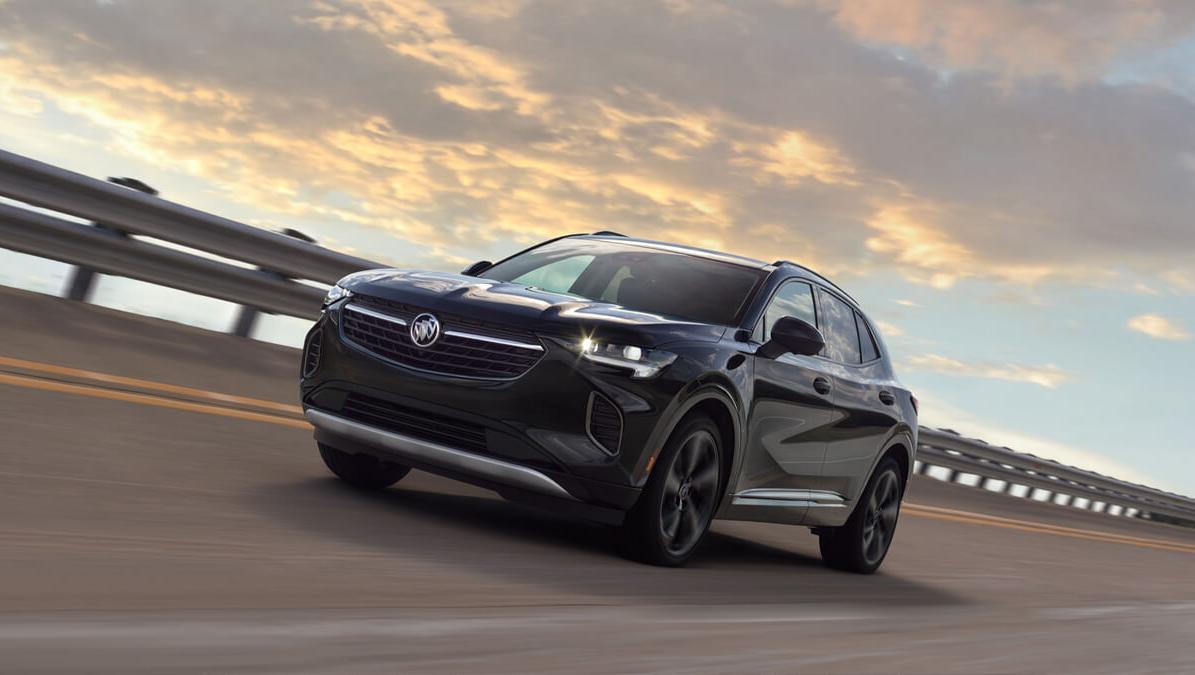 Drivers side front view of Buick Envision. Road motion shot Drivers side front view of Buick Envision. Road motion shot