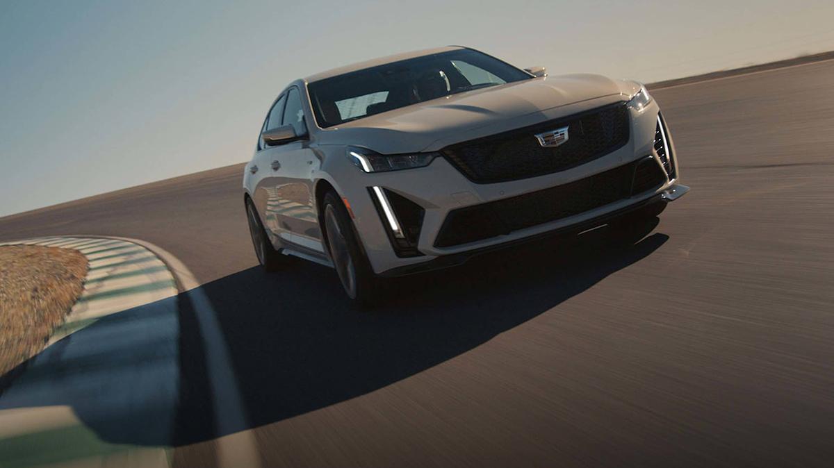 The 2023 Cadillac CT5-V is running on the road. The 2023 Cadillac CT5-V is running on the road.