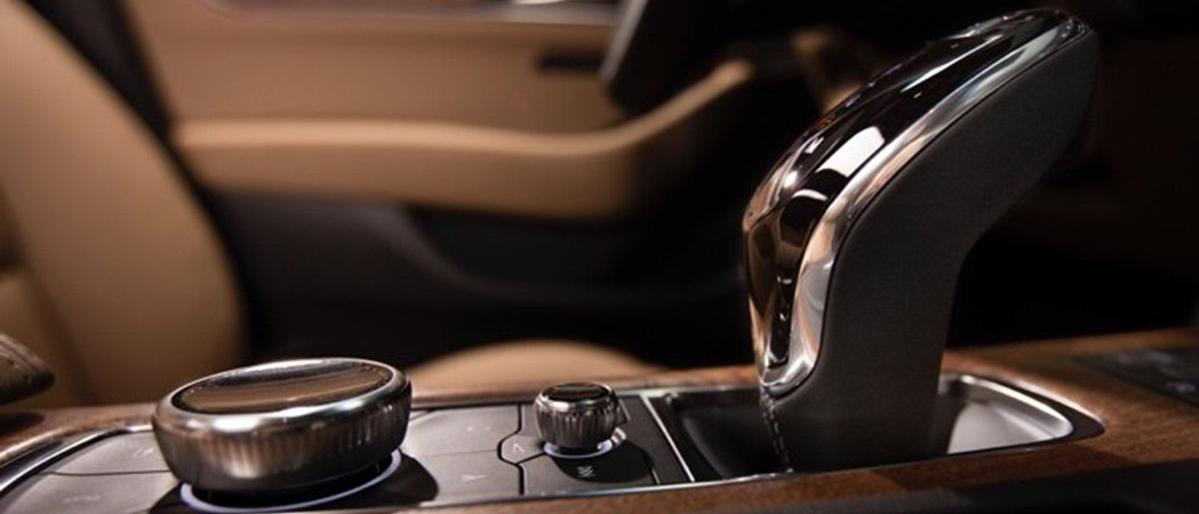Close-up view of a 2020 Cadillac's center console controls. Close-up view of a 2020 Cadillac's center console controls.