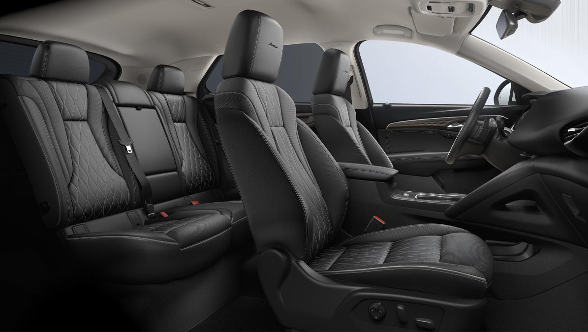 2023 Buick Envision interior in Ebony perforated leather-appointed seats with Ebony interior accents 2023 Buick Envision interior in Ebony perforated leather-appointed seats with Ebony interior accents