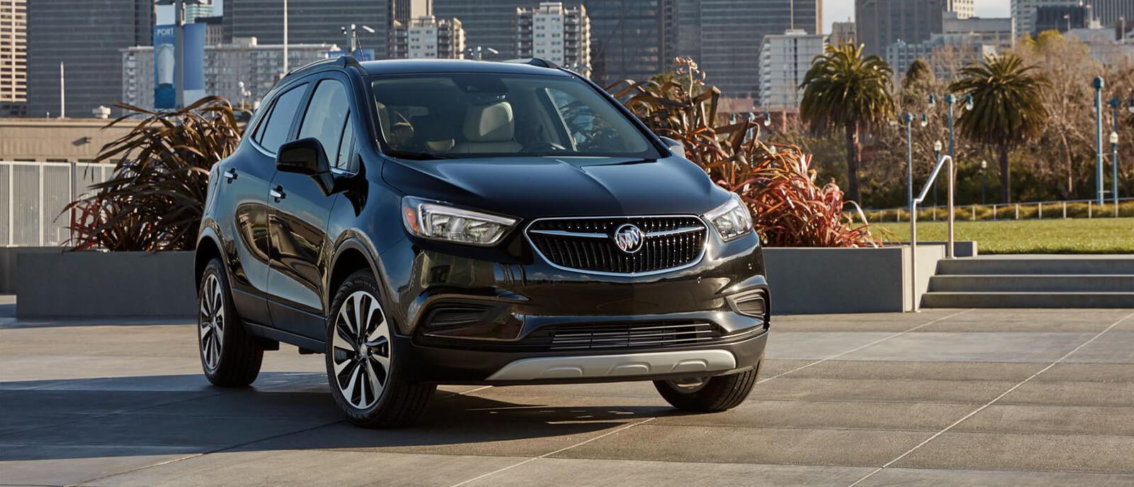 A black 2021 Buick parked on the road. A black 2021 Buick parked on the road.
