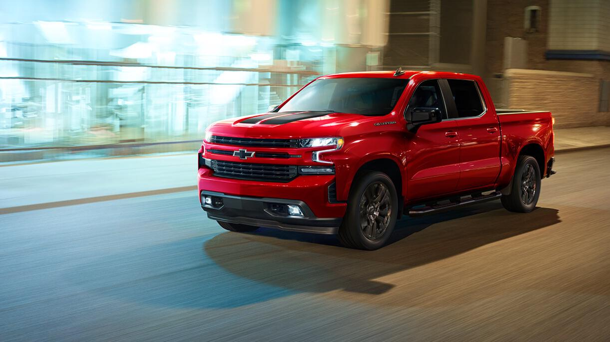 2021 Chevy Silverado 1500 driving through the city.
