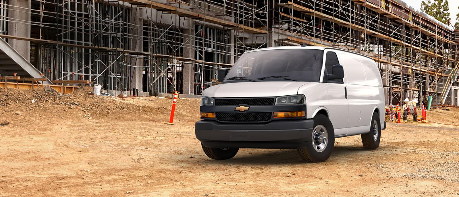 2021 Chevy Express Van parked on a construction site. 2021 Chevy Express Van parked on a construction site.