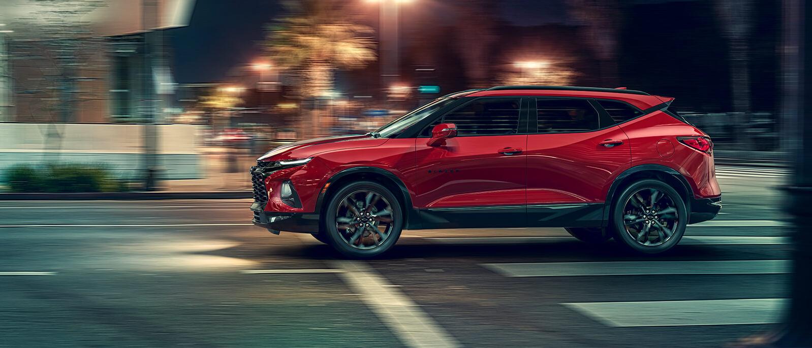 2021 Chevy Blazer driving through the city road. 2021 Chevy Blazer driving through the city road.