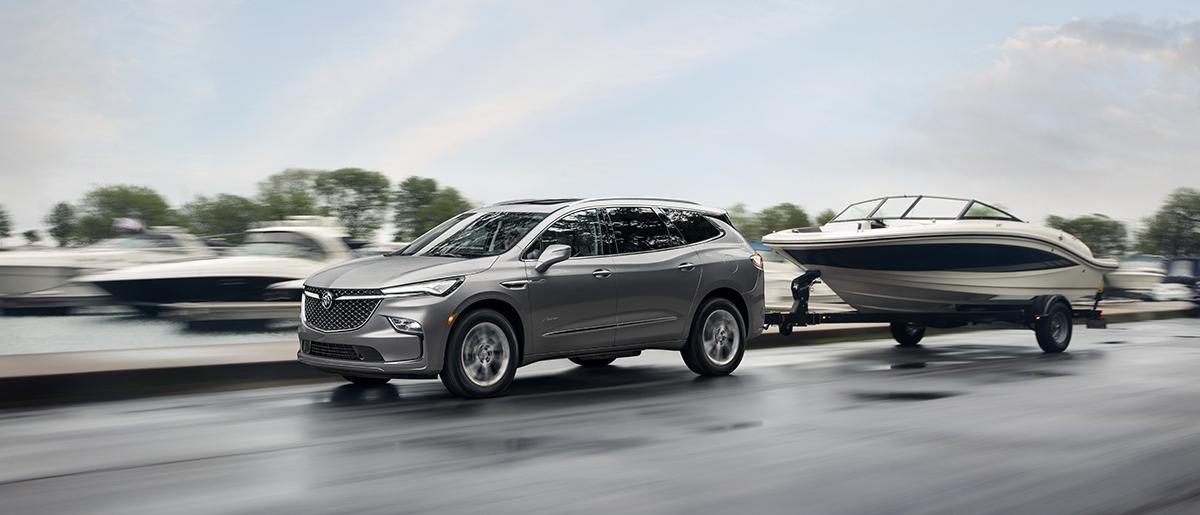 2023 Buick Enclave is towing the boat.