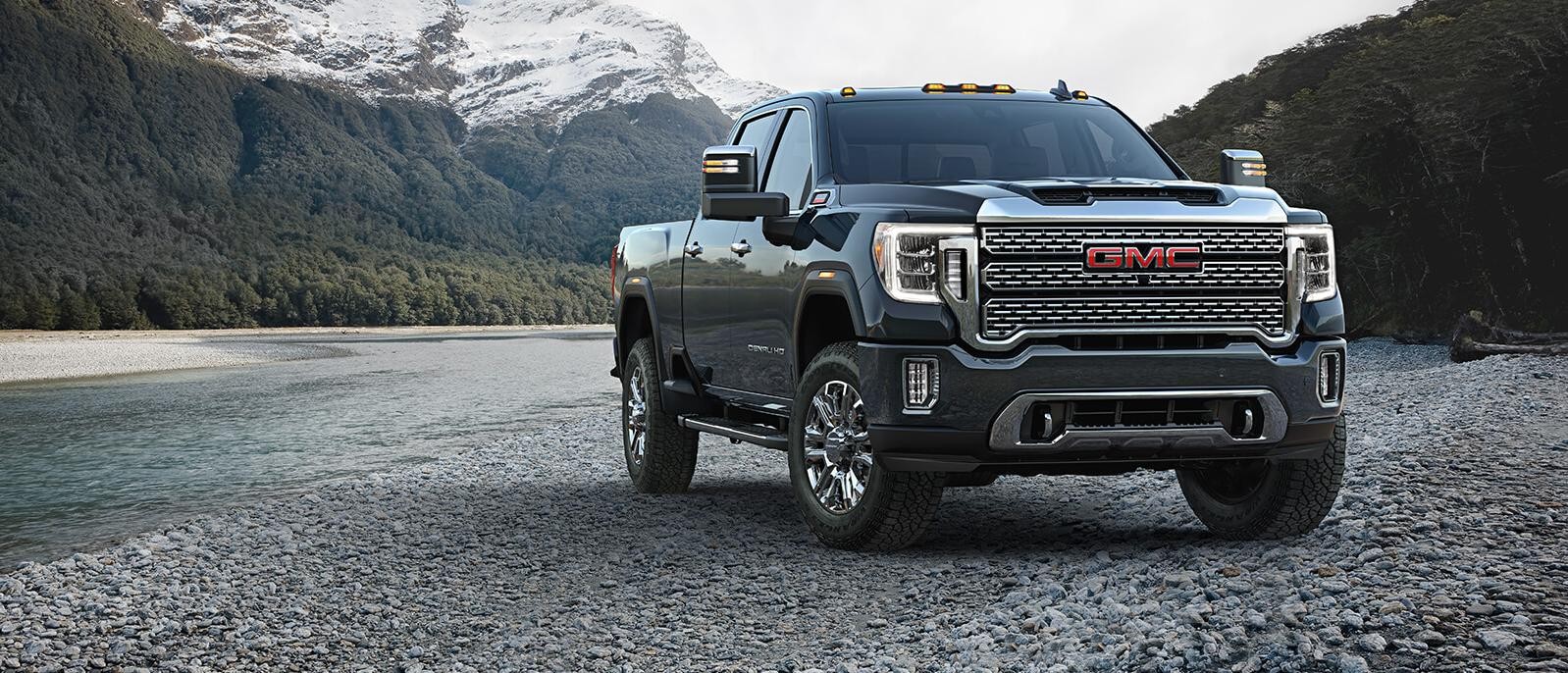 A 2021 GMC  Sierra 3500 near river bank