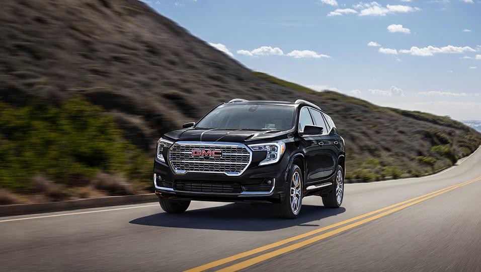 2024 GMC Terrain SLE & SLT on the road.