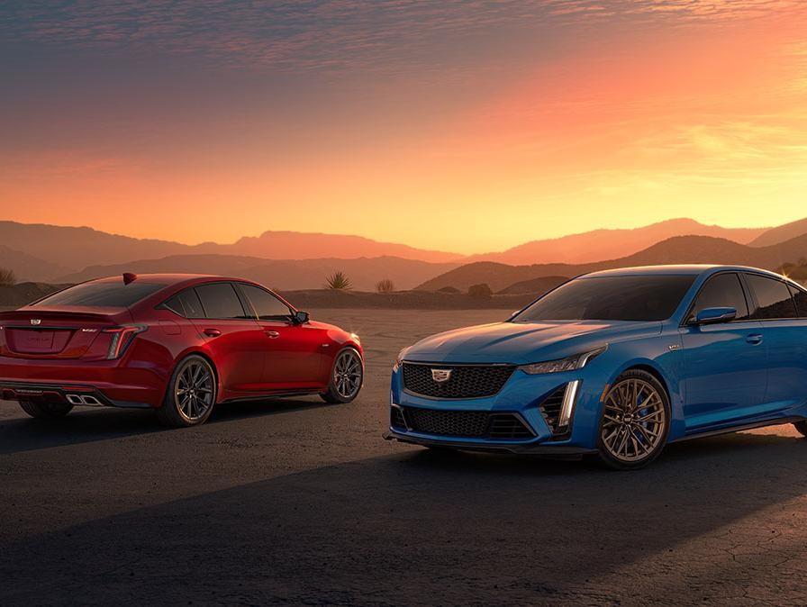 Cadillac CT5-V and CT5-V Blackwing overlooking sunset. Cadillac CT5-V and CT5-V Blackwing overlooking sunset.