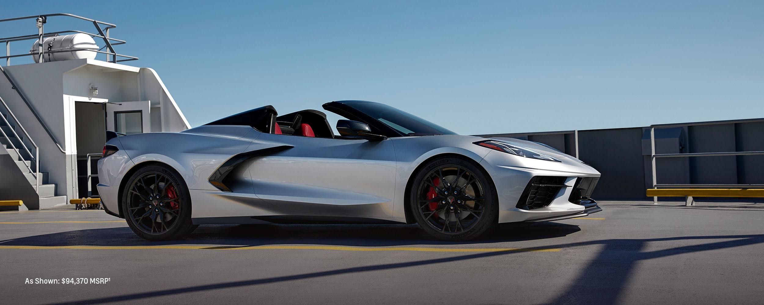 A Chevy Corvette cruising along a highway.