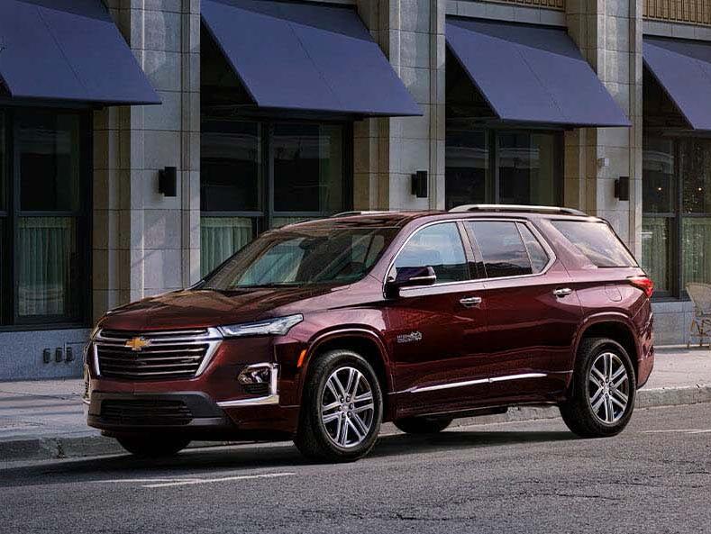Brown Chevy Traverse parked in public