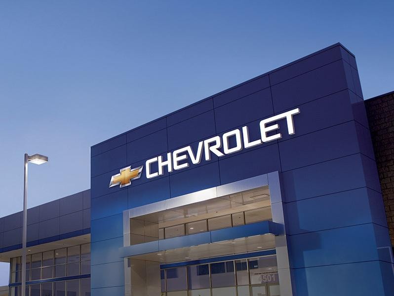 A Chevrolet dealership at sunset.