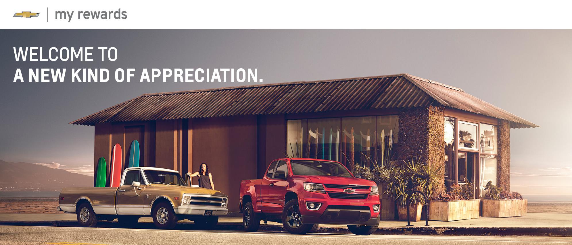 Chevy Vehicle in front of a gate.