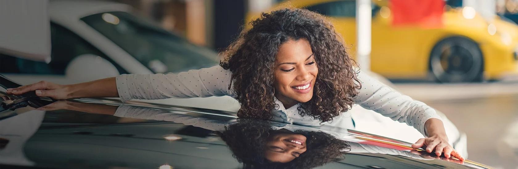 woman hugging gray hyundai