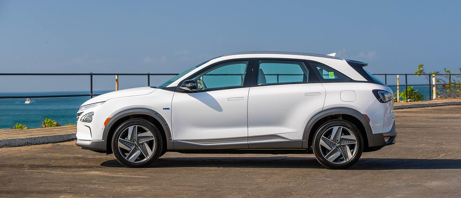A white 2022 Hyundai Nexo parked on a street.