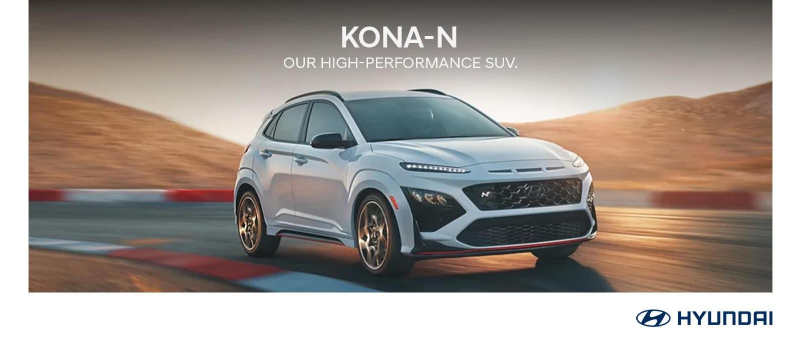 2023 Hyundai Kona N driving on road.