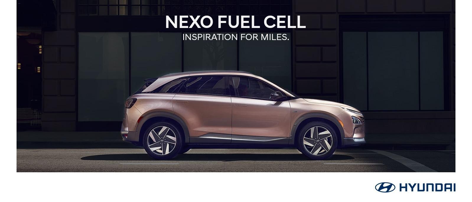 2023 Hyundai NEXO Fuel Cell parked in front of the building