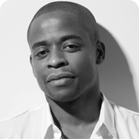 Black and white portrait of Dulé Hill.