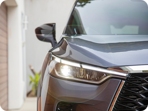 Close up view of an INFINITI QX60 headlight.