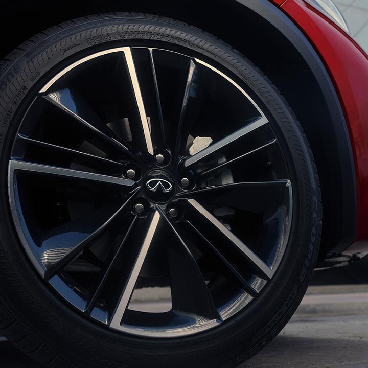 Close-up view of an INFINITI QX55 wheel. Close-up view of an INFINITI QX55 wheel.