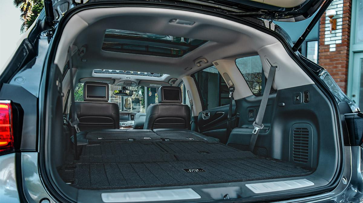 View of the interior of the INFINITI QX60 with the seats folded down. View of the interior of the INFINITI QX60 with the seats folded down.