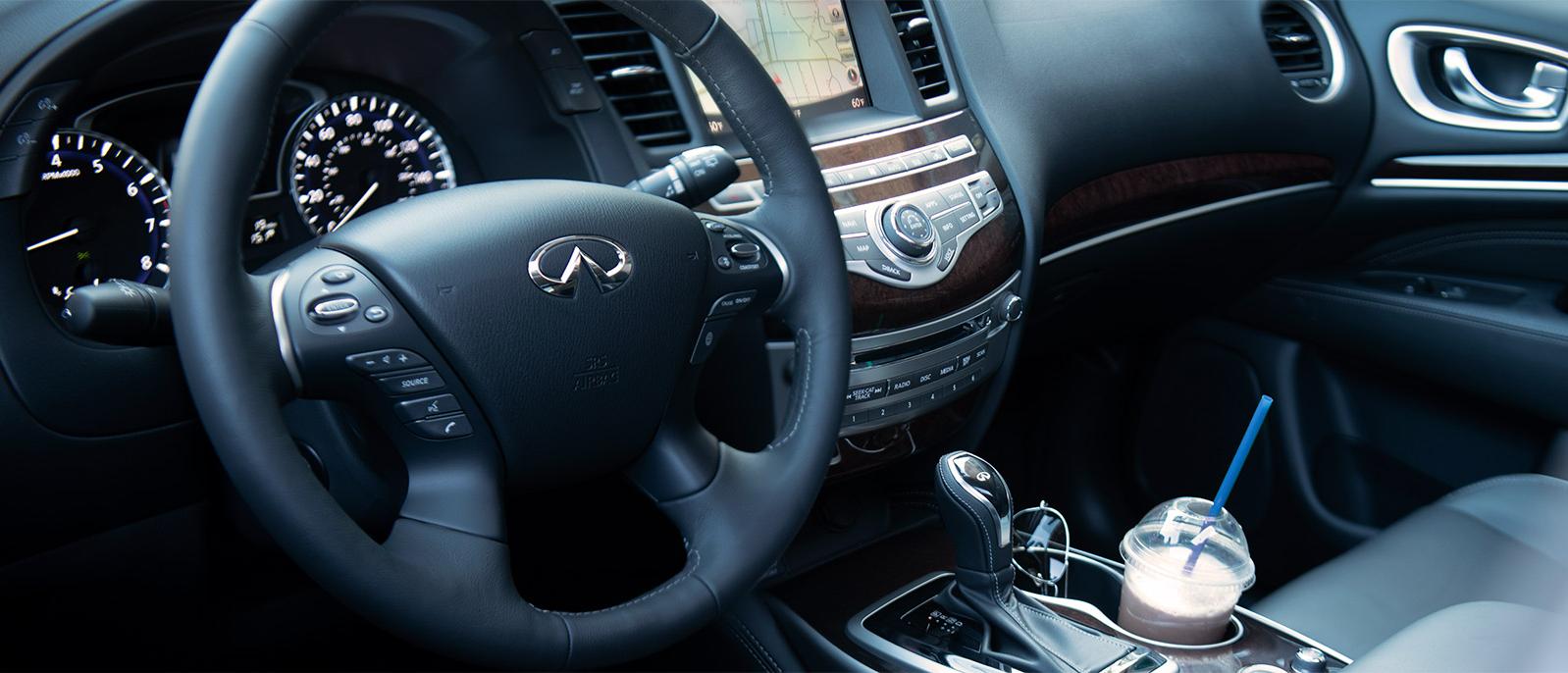 Interior view of an INFINITI QX60 from the driver's point of view. Interior view of an INFINITI QX60 from the driver's point of view.