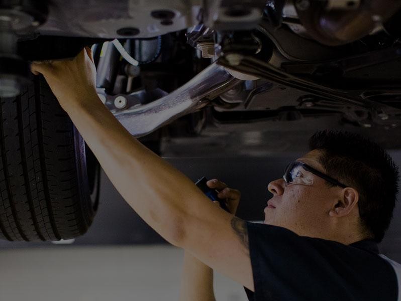 Lexus Technician Inspecting Lexus