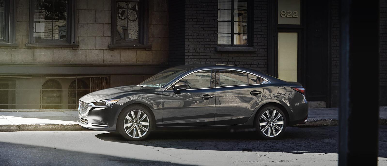 A 2021 Mazda6 parked on a city road. A 2021 Mazda6 parked on a city road.