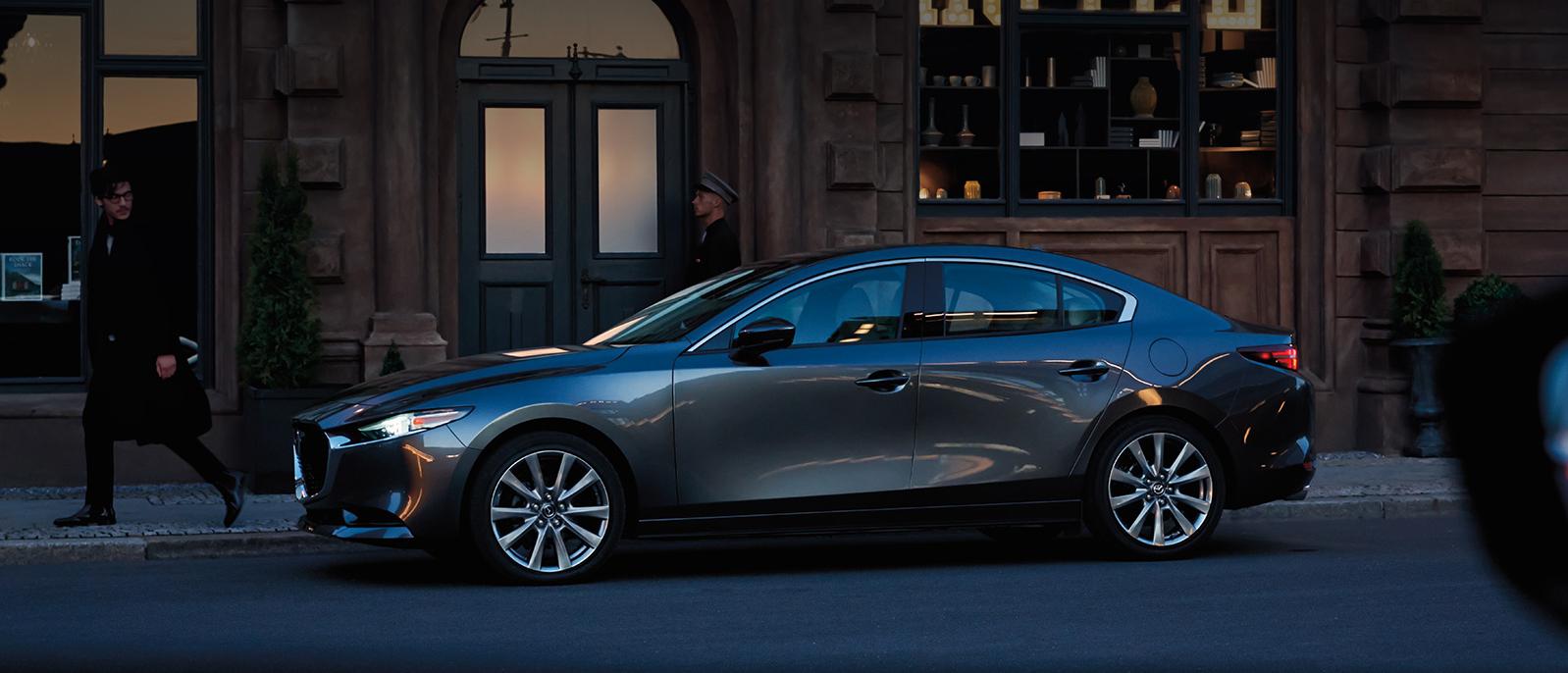 A 2022 Mazda 3 Sedan parked in the streets. A 2022 Mazda 3 Sedan parked in the streets.