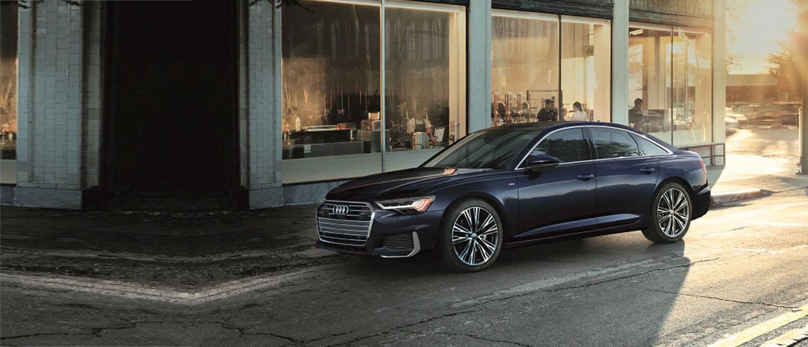 2020 Blue Audi A6 Sedan Parked on sidewalk