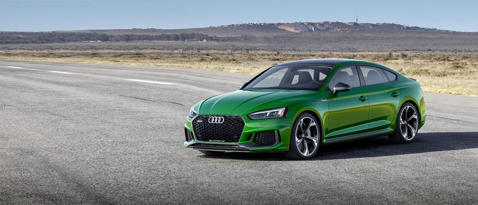 2020 Green Audi RS 5 Sportback Parked on sidewalk