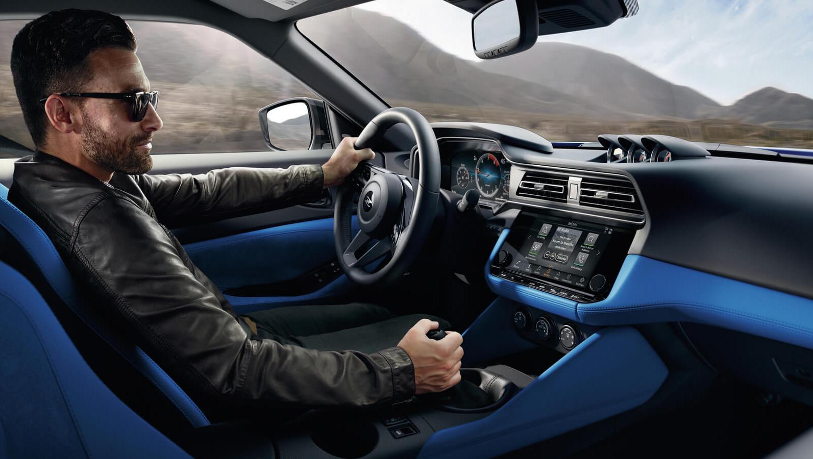 A man driving 2023 Nissan Z in style A man driving 2023 Nissan Z in style