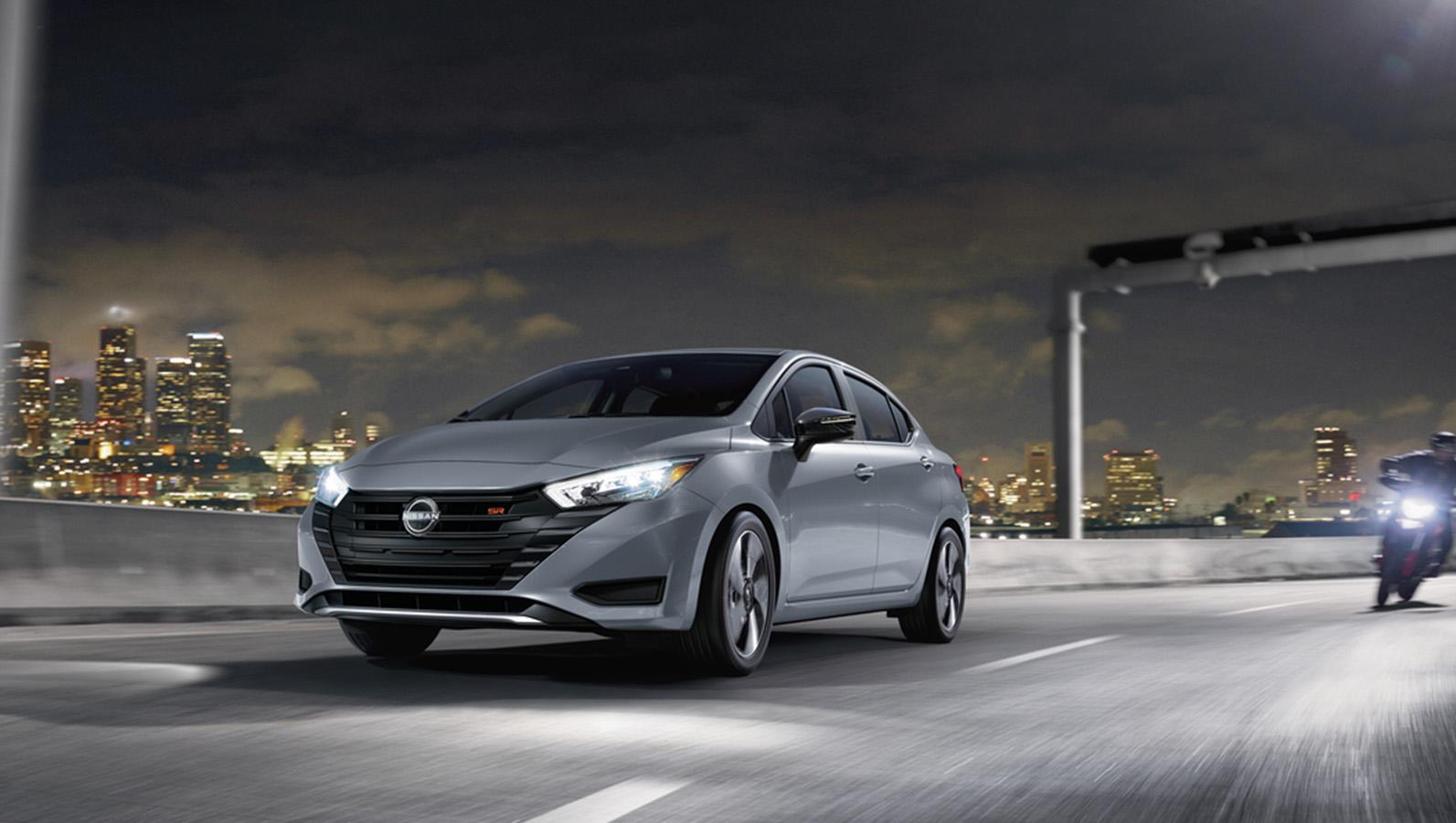2023 Nissan Versa on road. 2023 Nissan Versa on road.