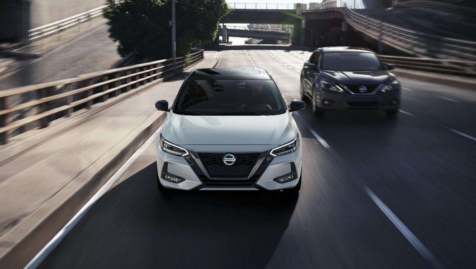 2023 Nissan Sentra on road. 2023 Nissan Sentra on road.
